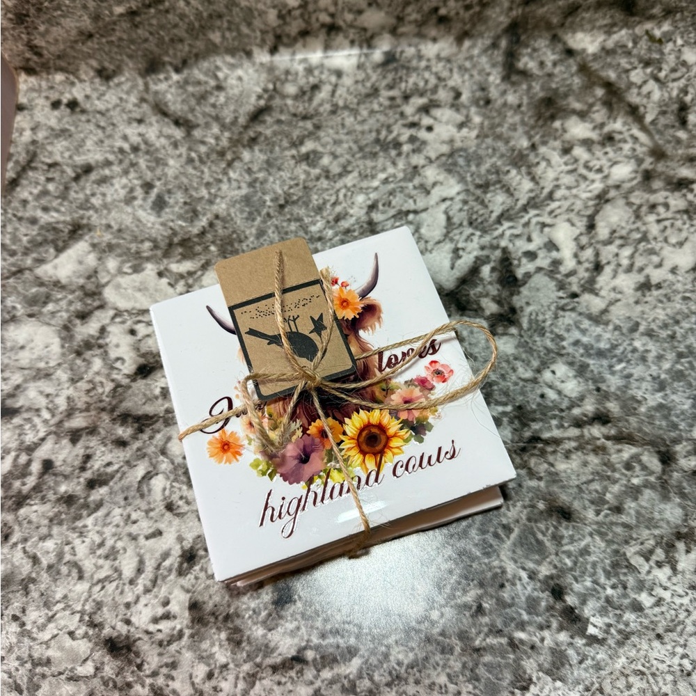 Floral Cow Coasters Set